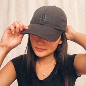Black Adidas baseball cap. Always-in-style hat that matches everything.